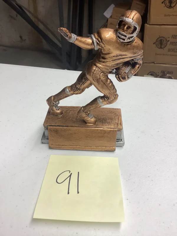 BRONZE FOOTBALL STIFF ARM