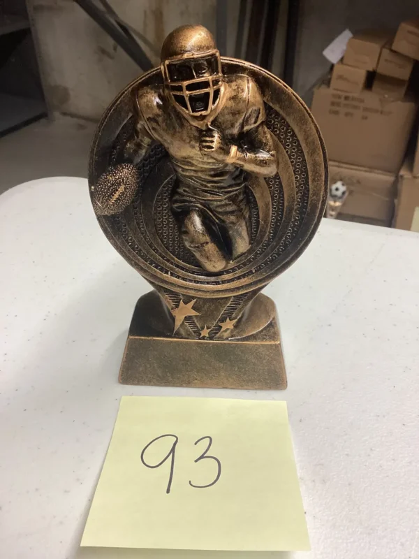 BRONZE FOOTBALL RUNNER OUT OF CIRCLE