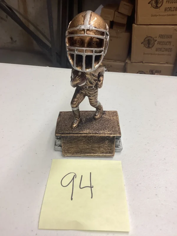 BRONZE MALE FOOTBALL BOBBLE HEAD