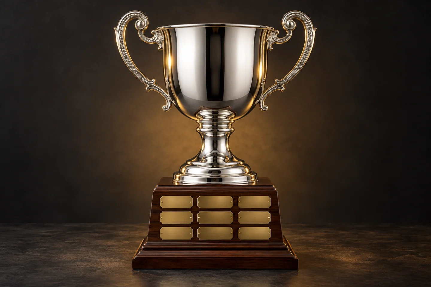 Illustration of a silver perpetual cup on walnut base with brass nameplates